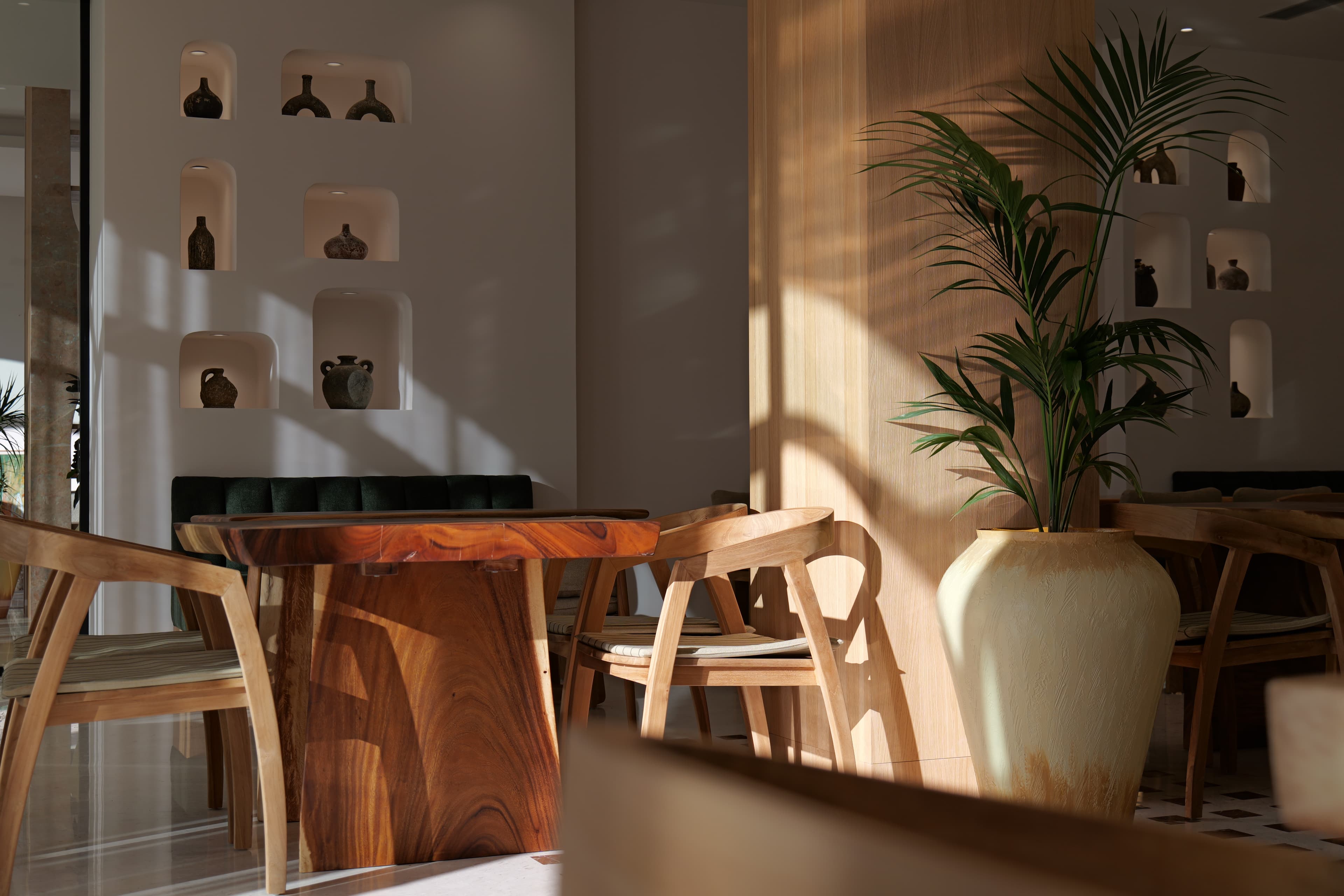 Luxury dining interior with marble details and wooden furniture